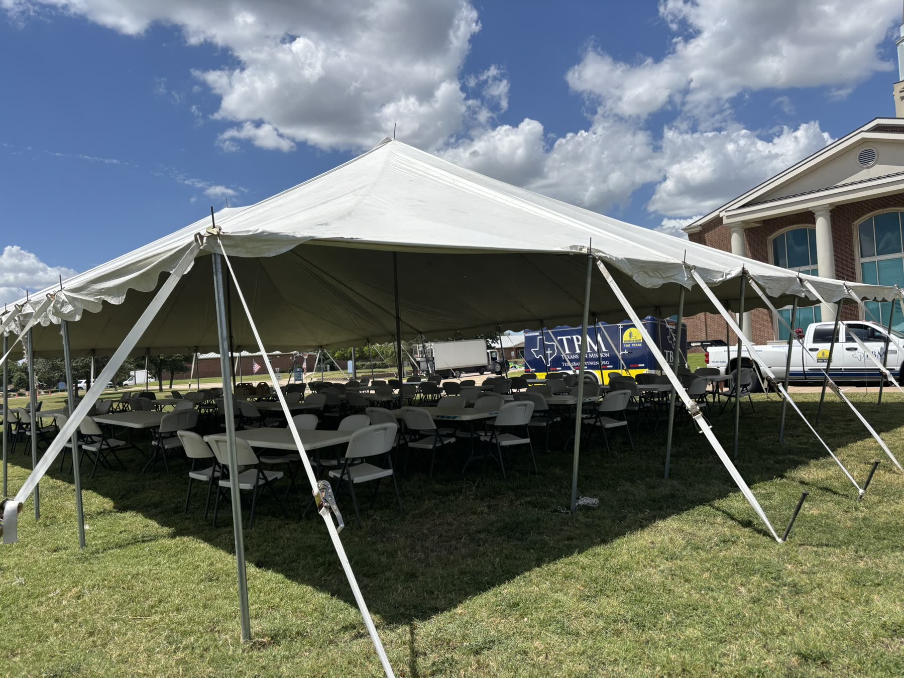ECDR tent ministry setup at Hillcrest Baptist Church during the July 2026 event.