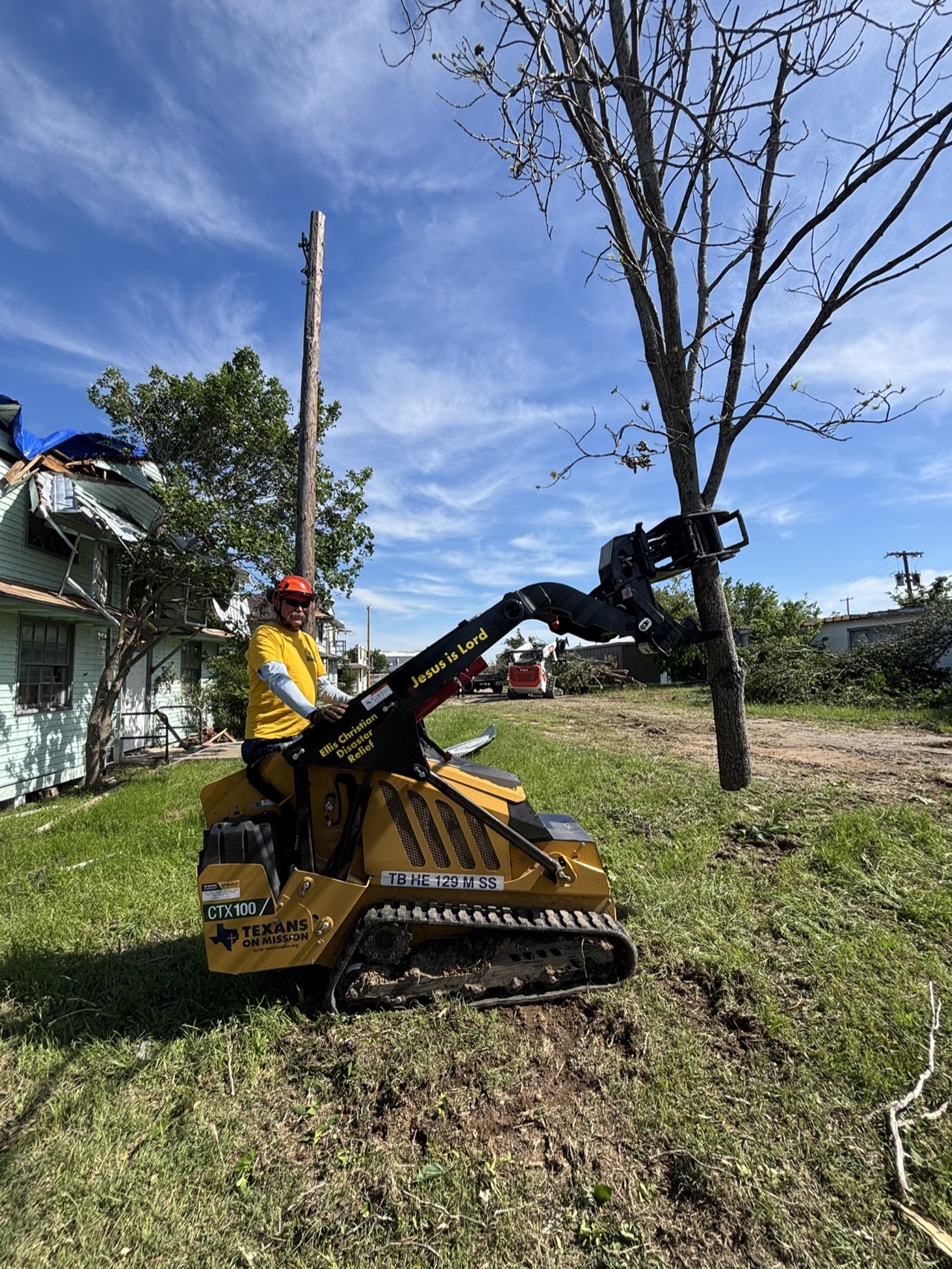 Chainsaw ministry volunteers working around damaged trees during the Mineral Wells deployment.